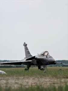 a fighter jet on the runway