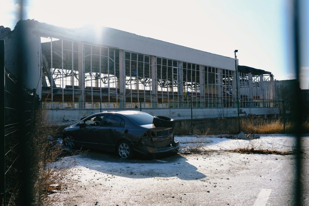 a car that is parked in front of a building