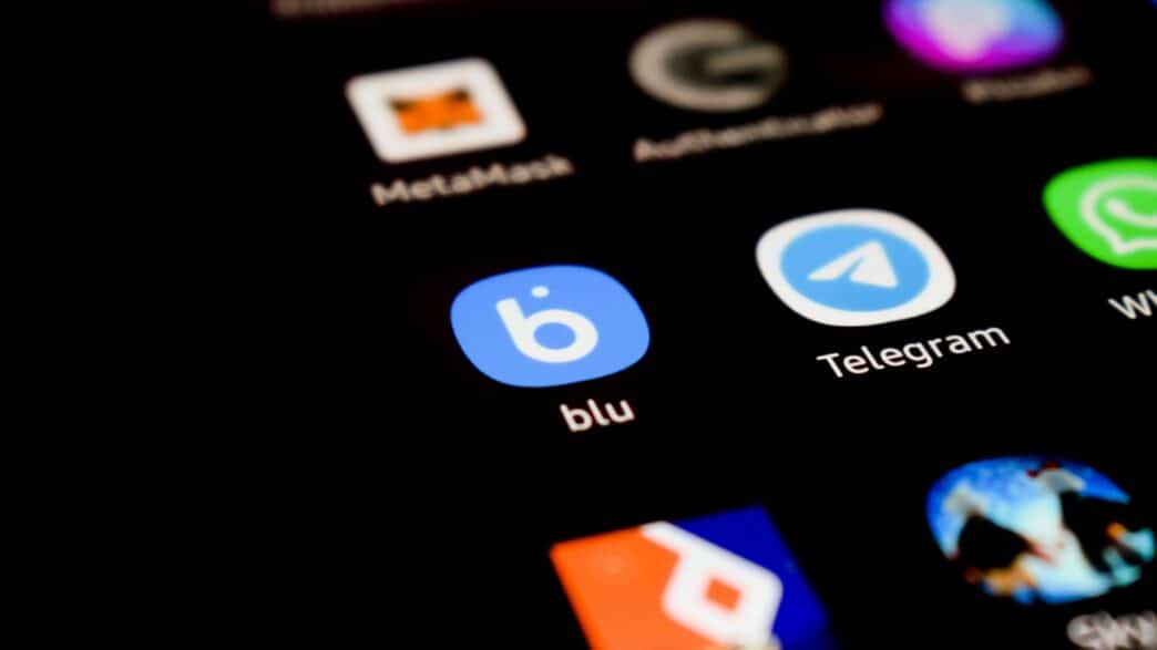 a close up of a cell phone with different app icons