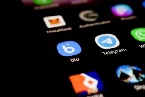 a close up of a cell phone with different app icons