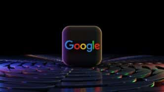 a close up of a computer keyboard with the word google on it