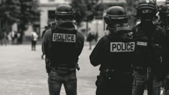 group of police grayscale photo