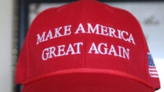 a red hat that says make america great again