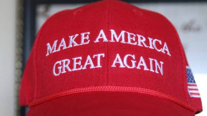 a red hat that says make america great again