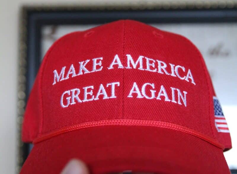 a red hat that says make america great again