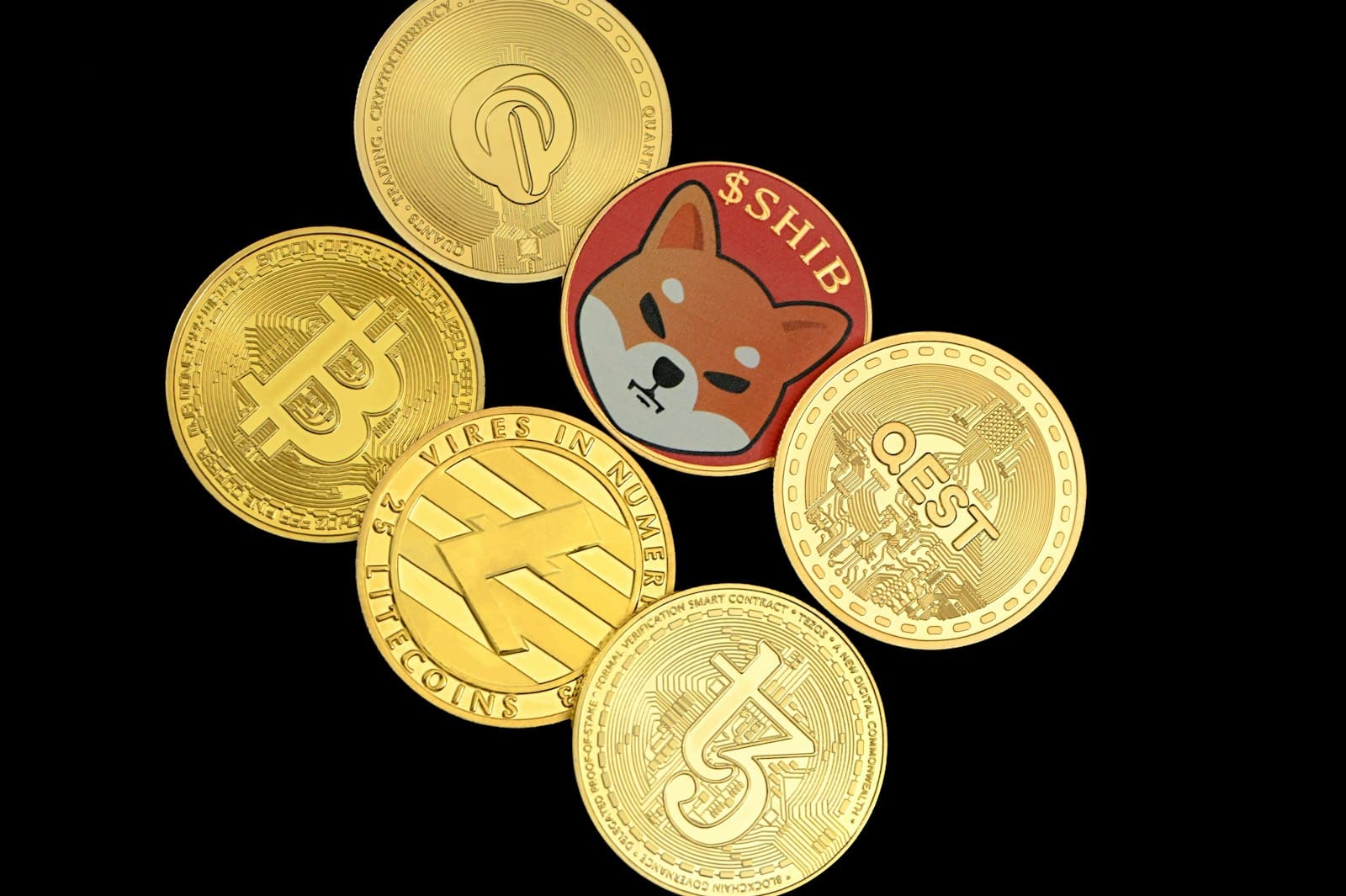 a pile of different types of coins
