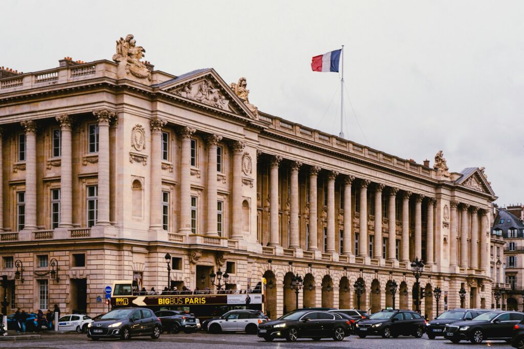 a large building with a flag on top of it