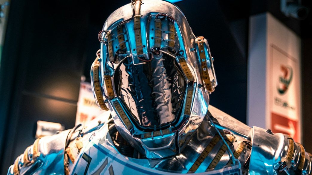 blue and black helmet on blue and white textile