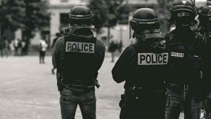 group of police grayscale photo